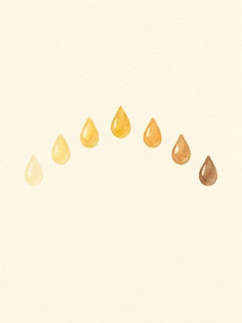 Watercolour drops of oil, clear gold turning cloudy